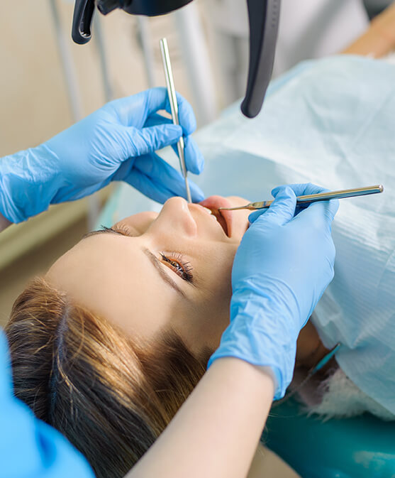 woman receiving a dental exam